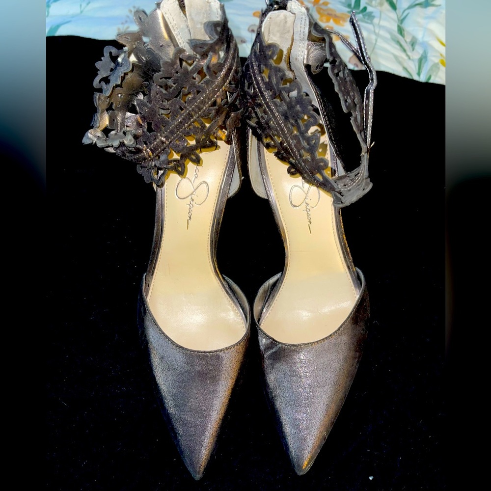 Amazing metallic purple heels. Only tried on.